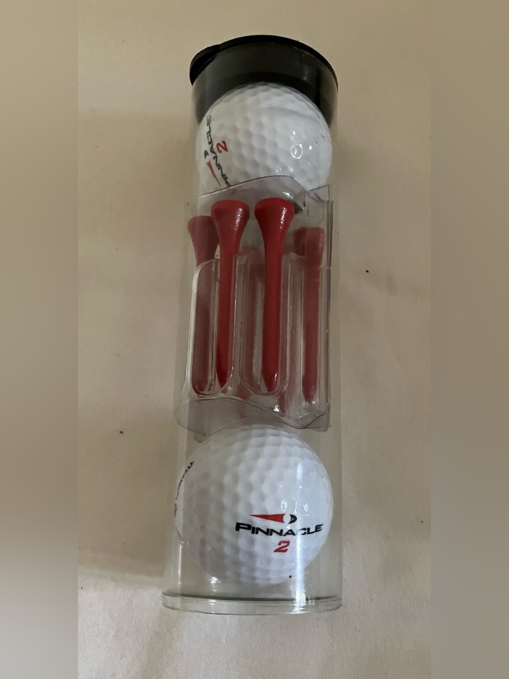 PINNACLE  with Stagecoach Log White Golf Balls with Red Tees - 2 Pa